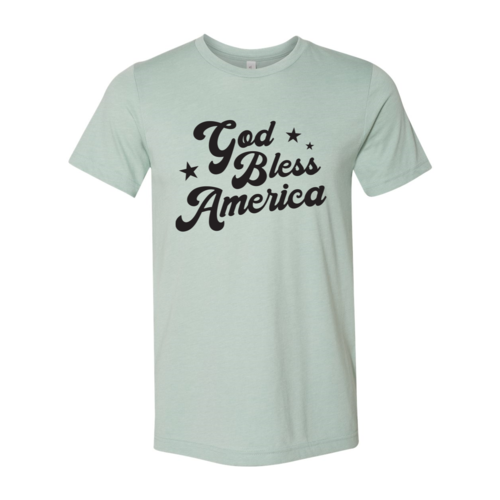 Amoura God Bless America T-shirt featuring patriotic design with American flag and stars on soft cotton fabric.